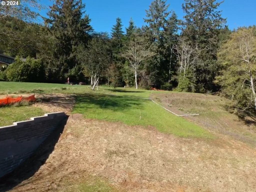501 Garibaldi Avenue, Unit 5 Garibaldi, OR 97118 - Photo 9 of 17 a view of a backyard with green space