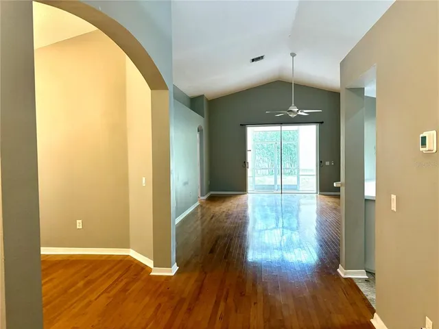 a view of entryway with wooden floor