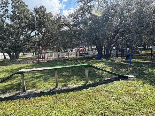 a view of a lake with a house