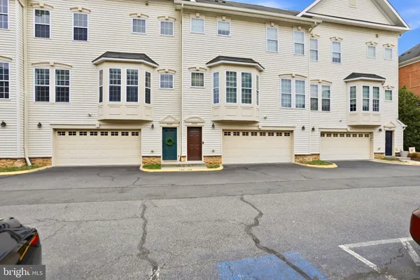 a front view of a building with glass windows