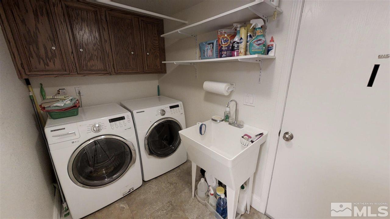 1970 Honey Ridge Drive Reno, NV 89511 - Photo 25 of 25 a utility room with dryer and washer