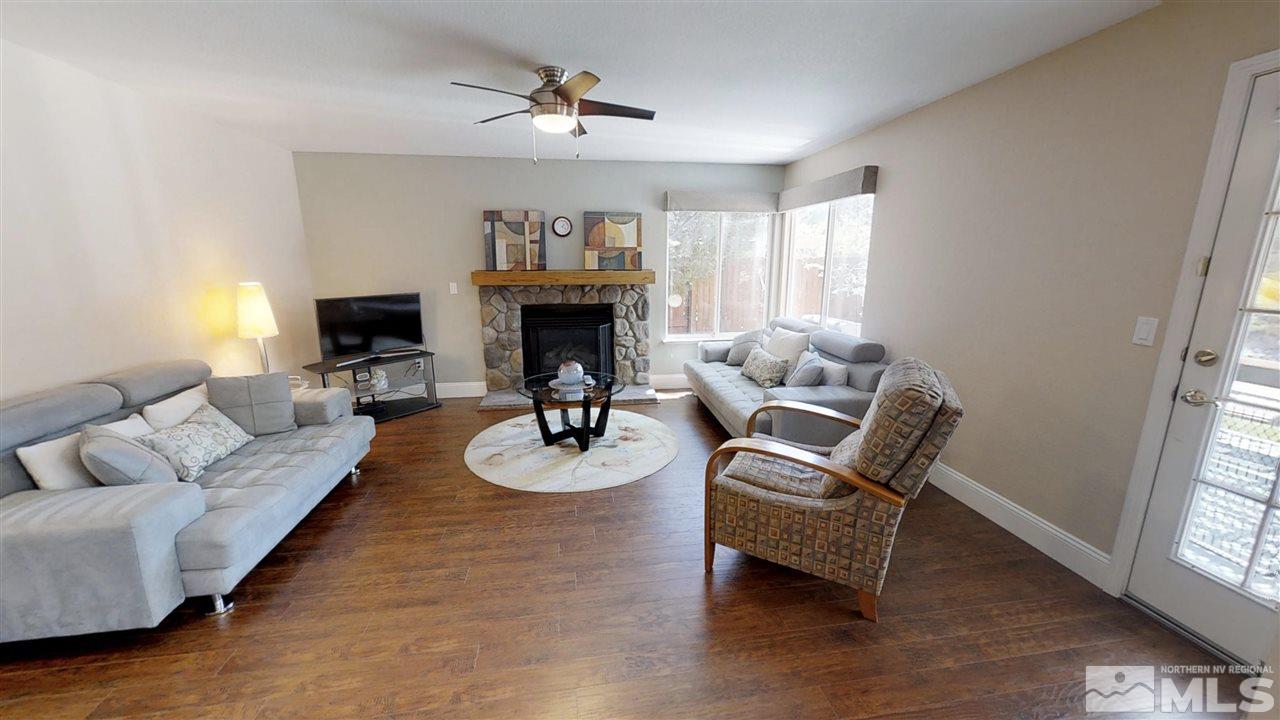 1970 Honey Ridge Drive Reno, NV 89511 - Photo 7 of 25 a living room with furniture and a fireplace