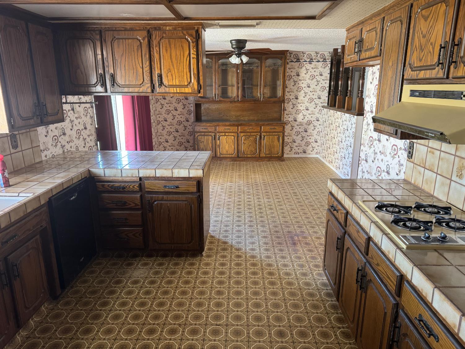 376 East Klepper Avenue Caruthers, CA 93609 - Photo 12 of 13 a kitchen with a stove and a sink