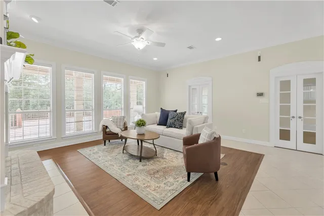 a living room with furniture rug and window