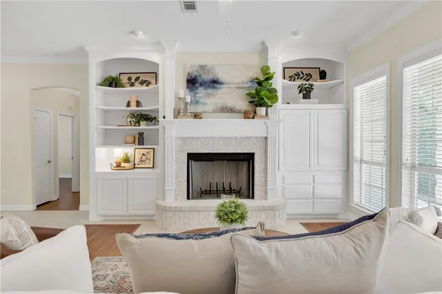 a kitchen with a sink cabinets and window