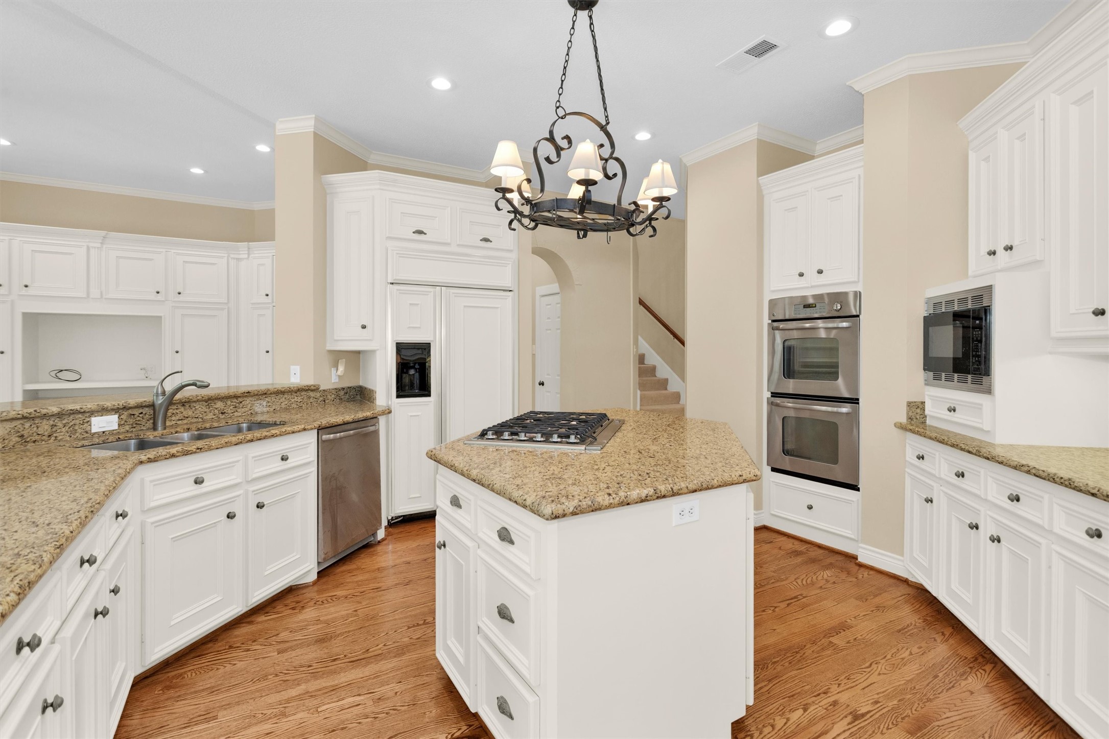 263 Saddle Ridge Spring, TX 77380 - Photo 24 of 50 Large Island Kitchen with Viking Gas Cooktop and Downdraft.