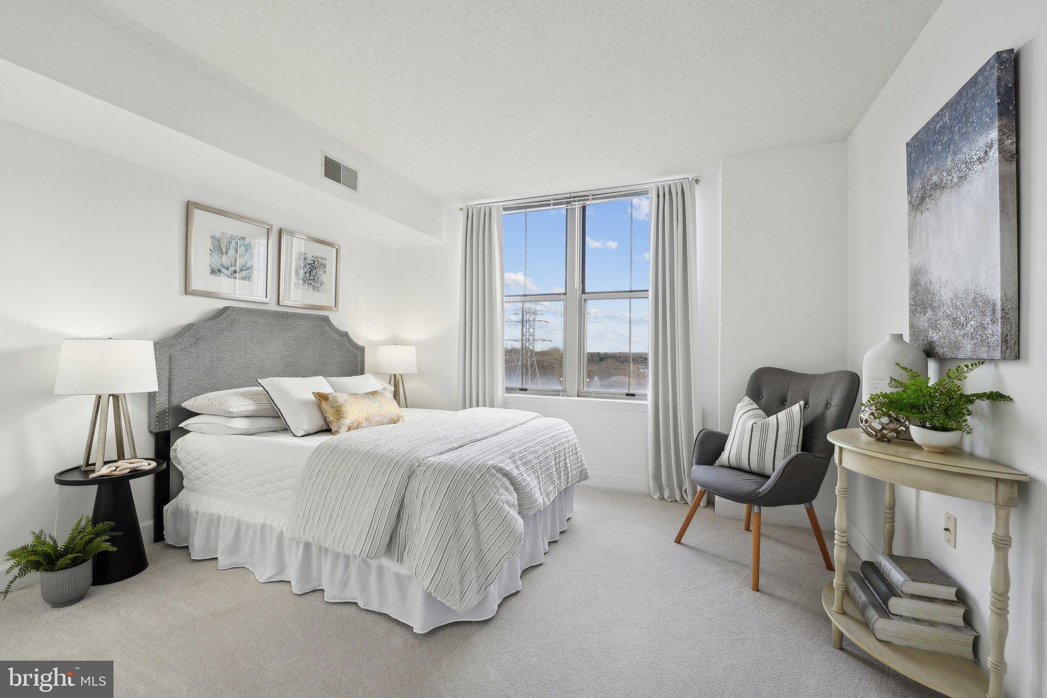 11800 Sunset Hills Road, Unit 605 Reston, VA 20190 - Photo 11 of 33 Master bedroom with walk-in closet