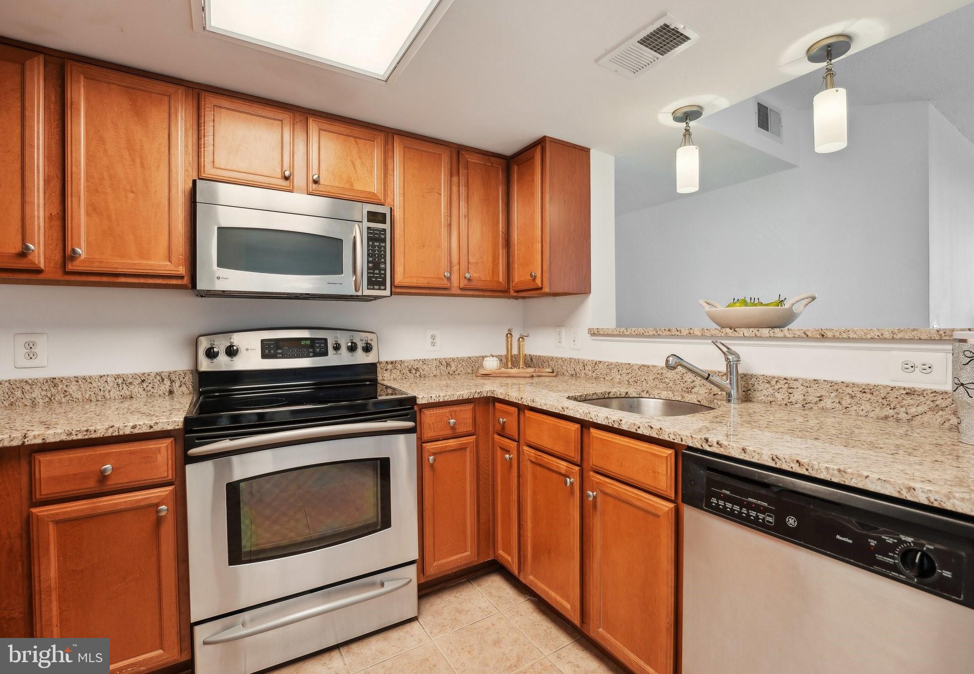 11800 Sunset Hills Road, Unit 605 Reston, VA 20190 - Photo 10 of 33 Kitchen with granite counters