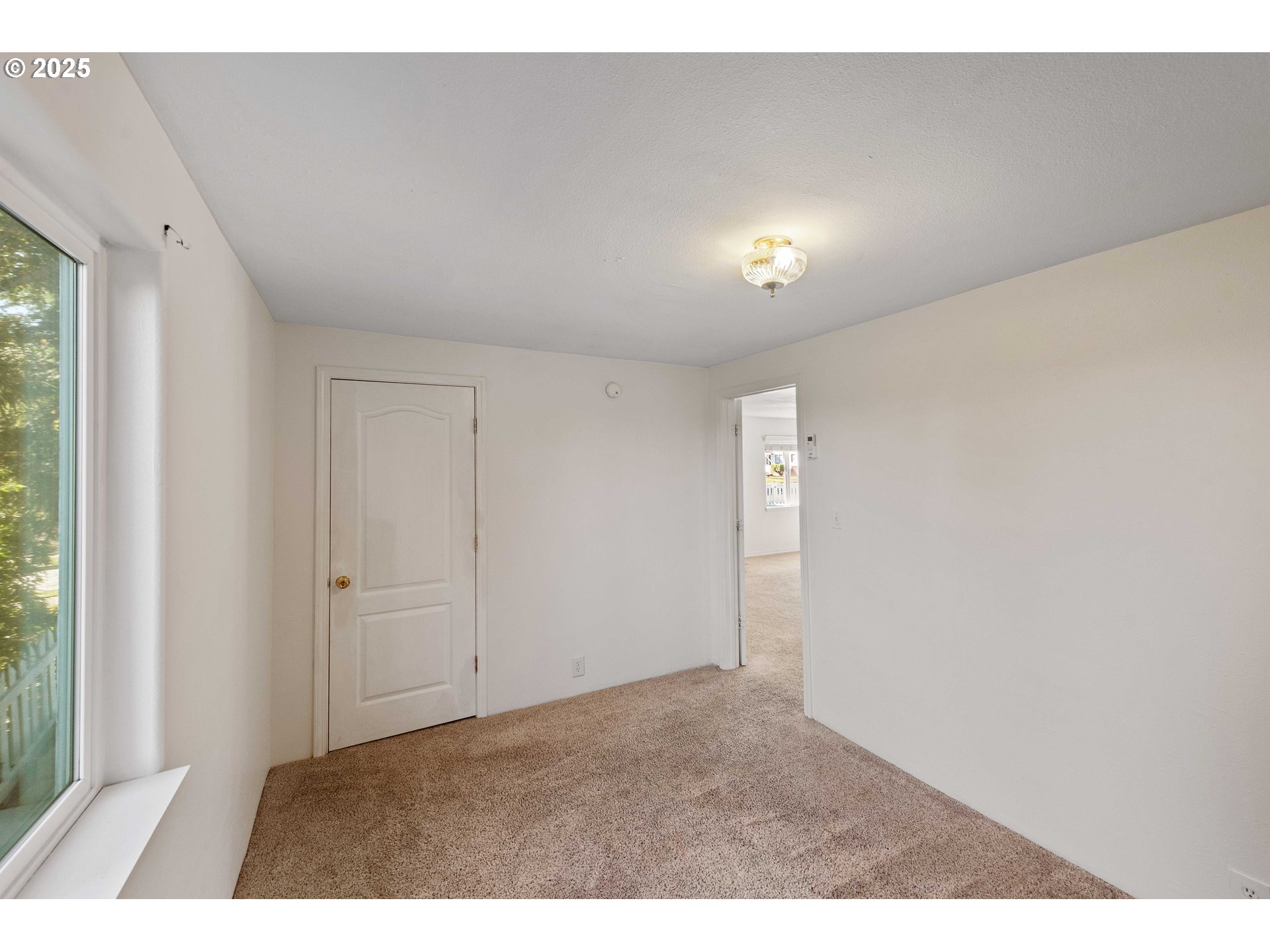 584 Exchange Street North Bend, OR 97459 - Photo 19 of 48 a view of an empty room and window