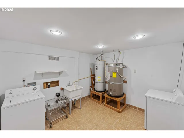 a living room with furniture and gym equipment