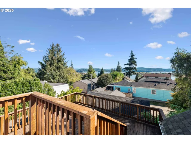 a view of a balcony with chairs