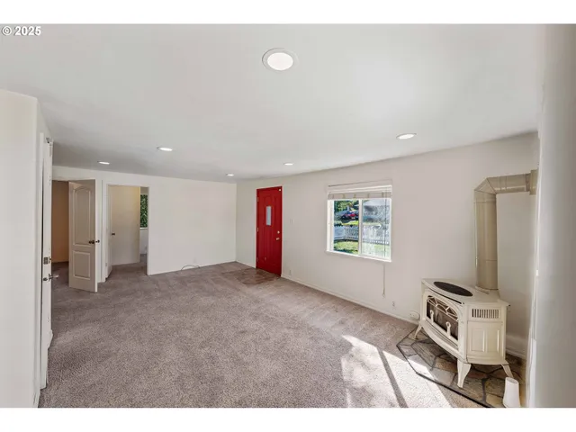 a view of livingroom with furniture and windows
