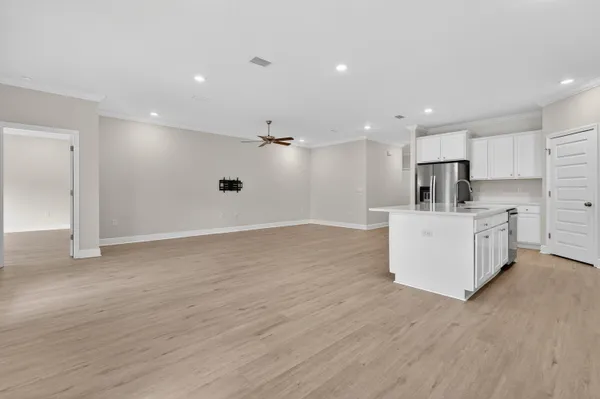 a view of kitchen with wooden floor