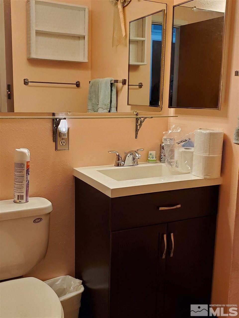 3440 Rauscher Drive Reno, NV 89503 - Photo 3 of 8 a bathroom with a sink and a toilet