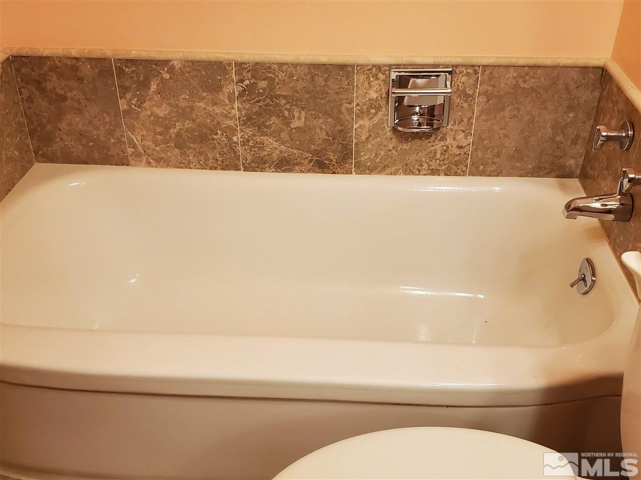 3440 Rauscher Drive Reno, NV 89503 - Photo 4 of 8 a bathroom with a toilet and a sink
