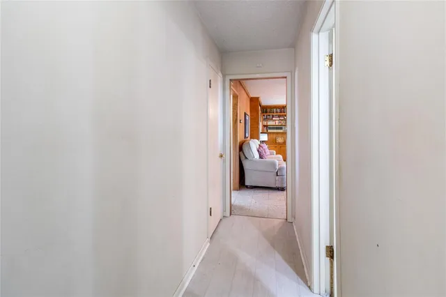 a view of a bedroom from a hallway