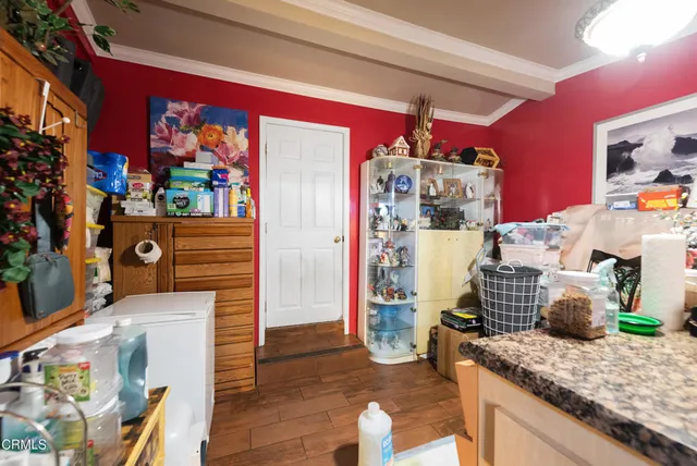a view of balcony with wooden floor and fence