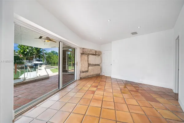 a view of an empty room and window