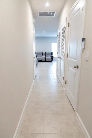 a view of hallway with a couch