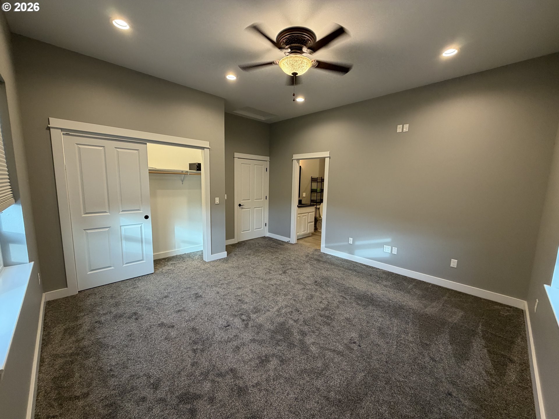 788 Patrick Street Coos Bay, OR 97420 - Photo 11 of 28 en empty room with closet and a chandelier fan