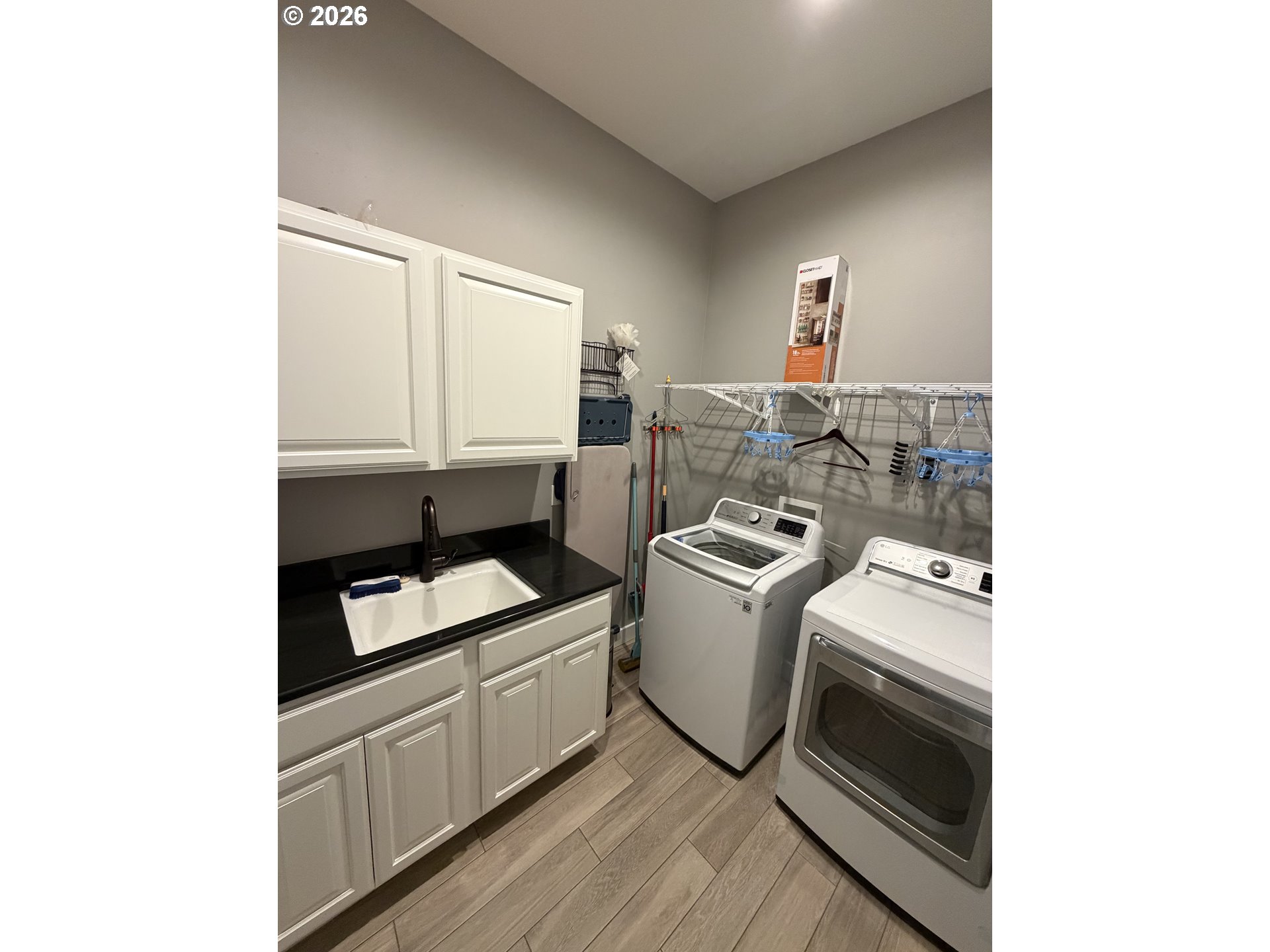 788 Patrick Street Coos Bay, OR 97420 - Photo 14 of 28 a room with storage and utility