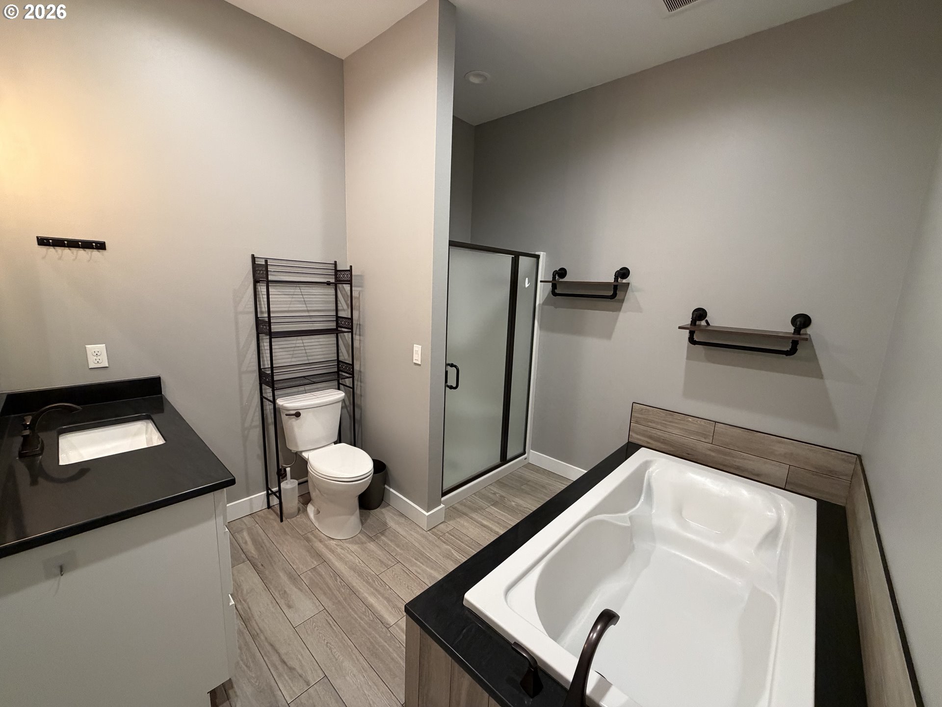 788 Patrick Street Coos Bay, OR 97420 - Photo 17 of 28 a bathroom with a sink toilet and shower