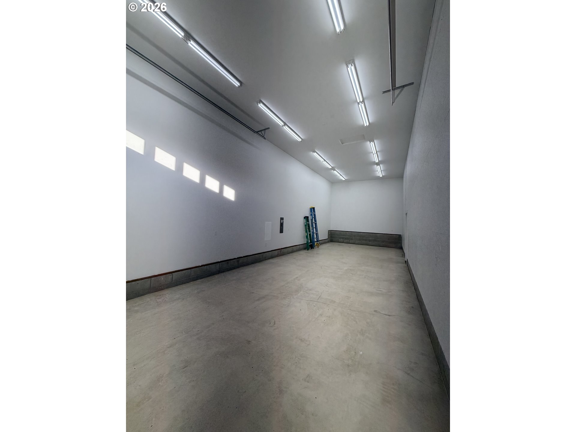 788 Patrick Street Coos Bay, OR 97420 - Photo 22 of 28 a view of a hallway with a large window