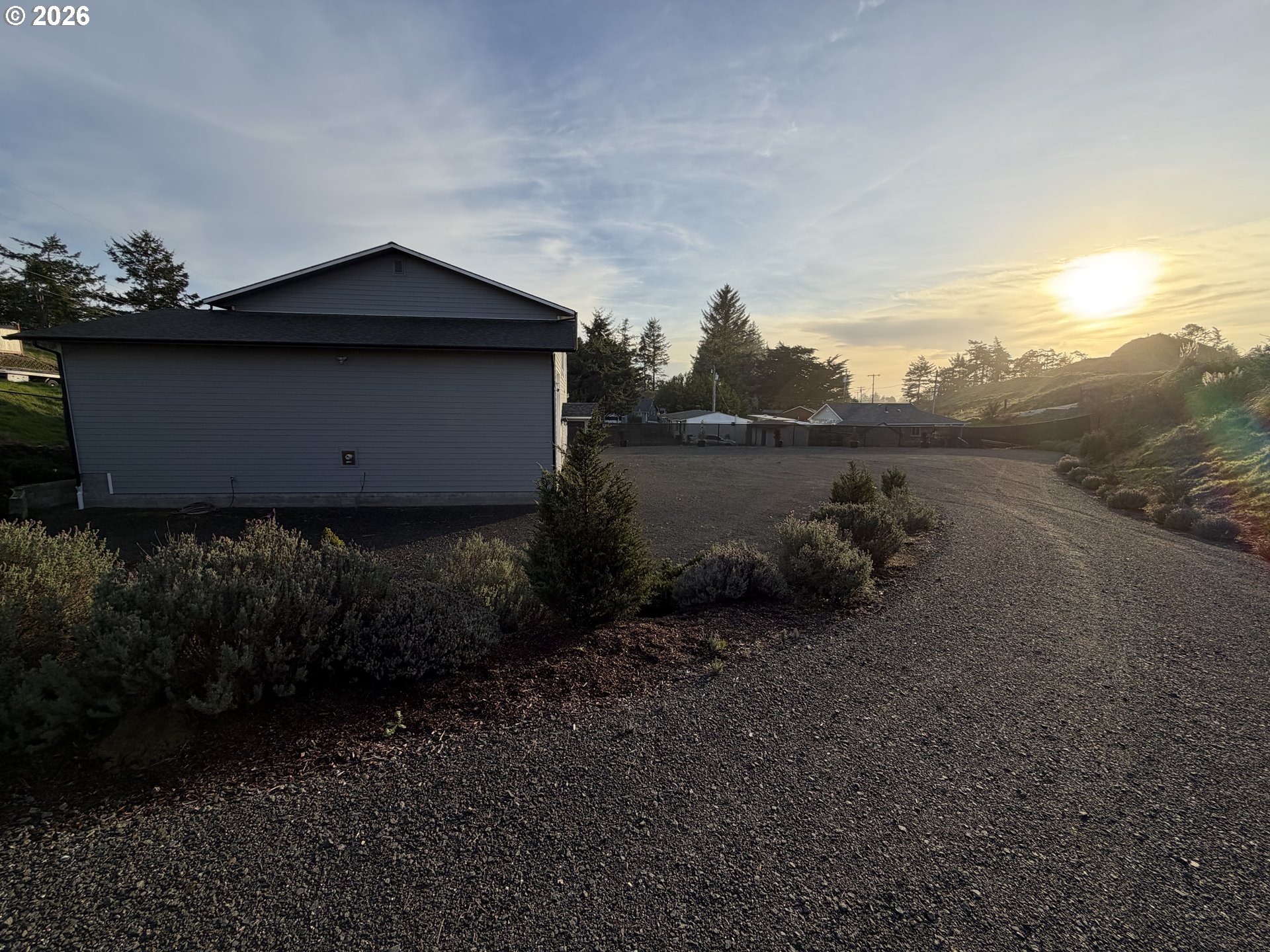 788 Patrick Street Coos Bay, OR 97420 - Photo 27 of 28 a backyard of a house with lots of green space