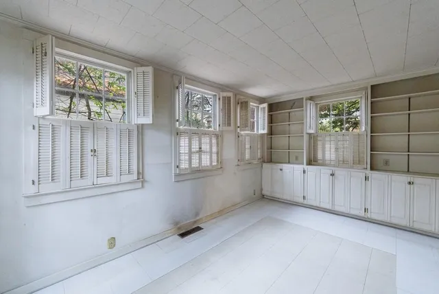 an empty room with windows