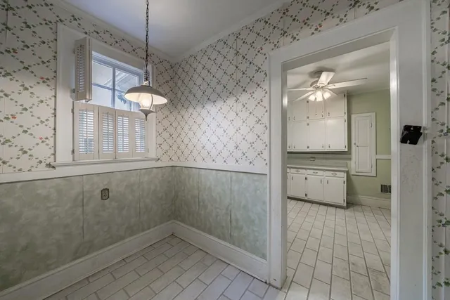 a bathroom with a sink a mirror and a shower