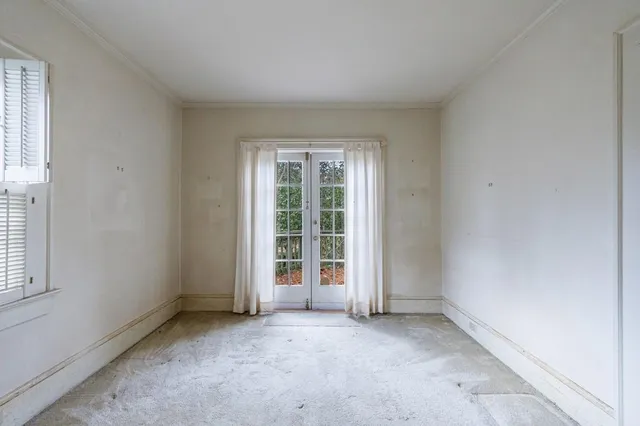 an empty room with windows