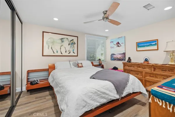 a bed room with a bed and a couch