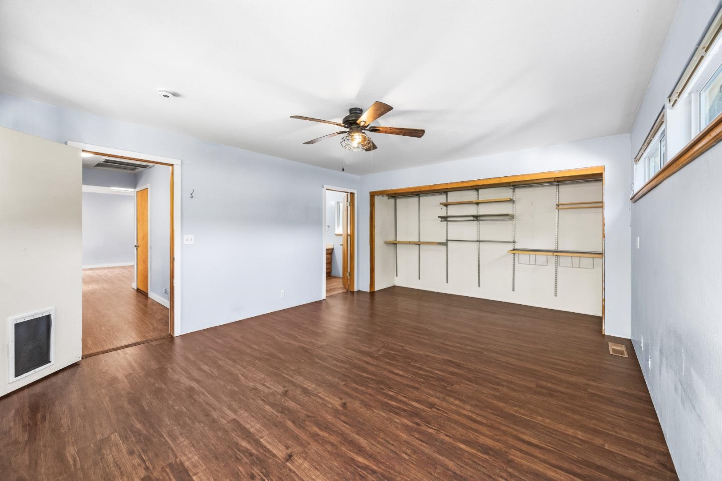 15666 Kings Creek Road Boulder Creek, CA 95006 - Photo 11 of 40 wooden floor in an empty room with a window
