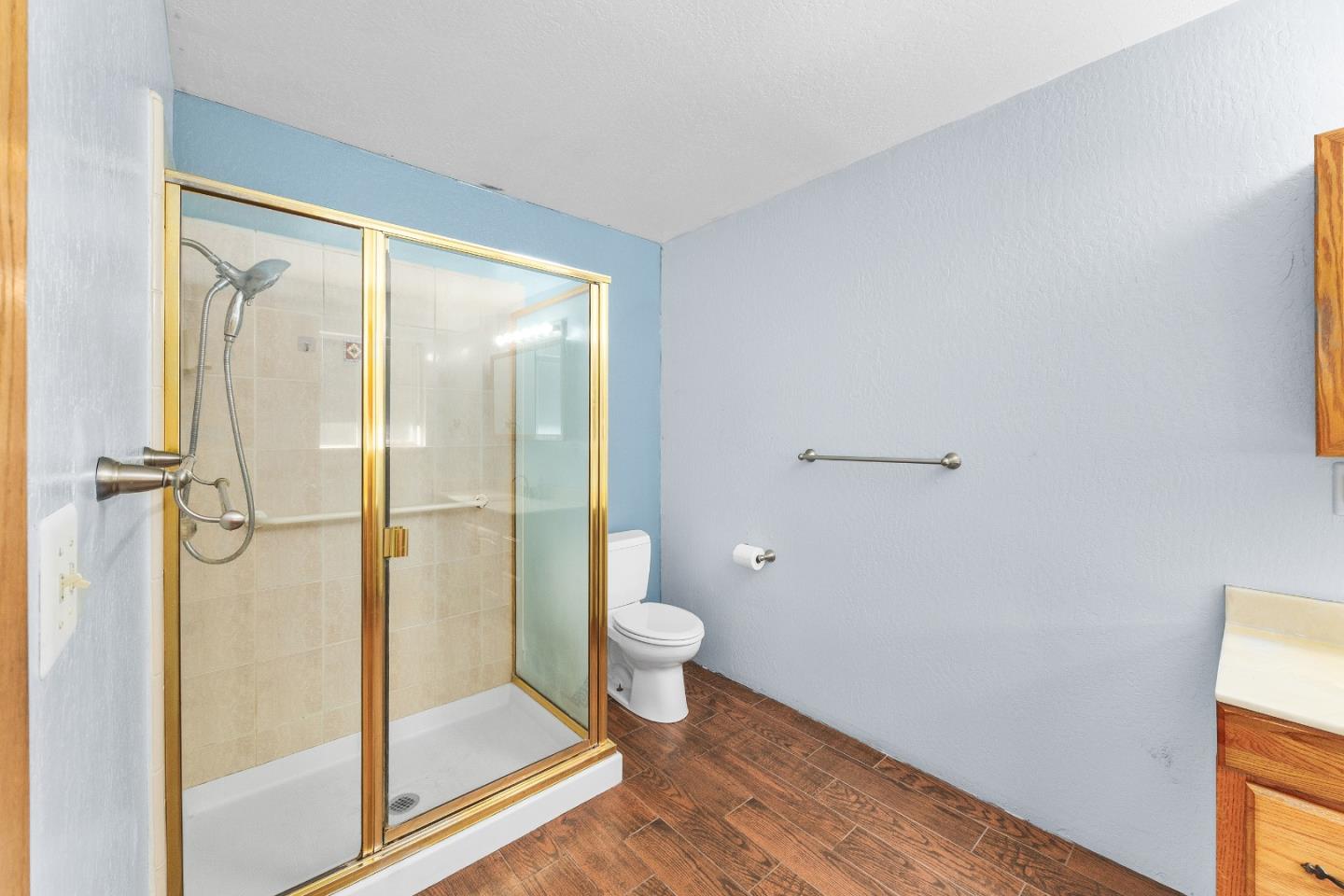 15666 Kings Creek Road Boulder Creek, CA 95006 - Photo 13 of 40 a bathroom with a glass shower door