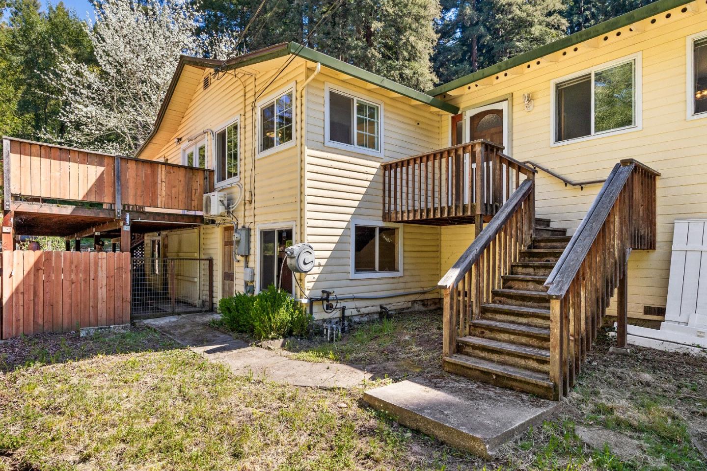 15666 Kings Creek Road Boulder Creek, CA 95006 - Photo 25 of 40 a view of a house with backyard and sitting area
