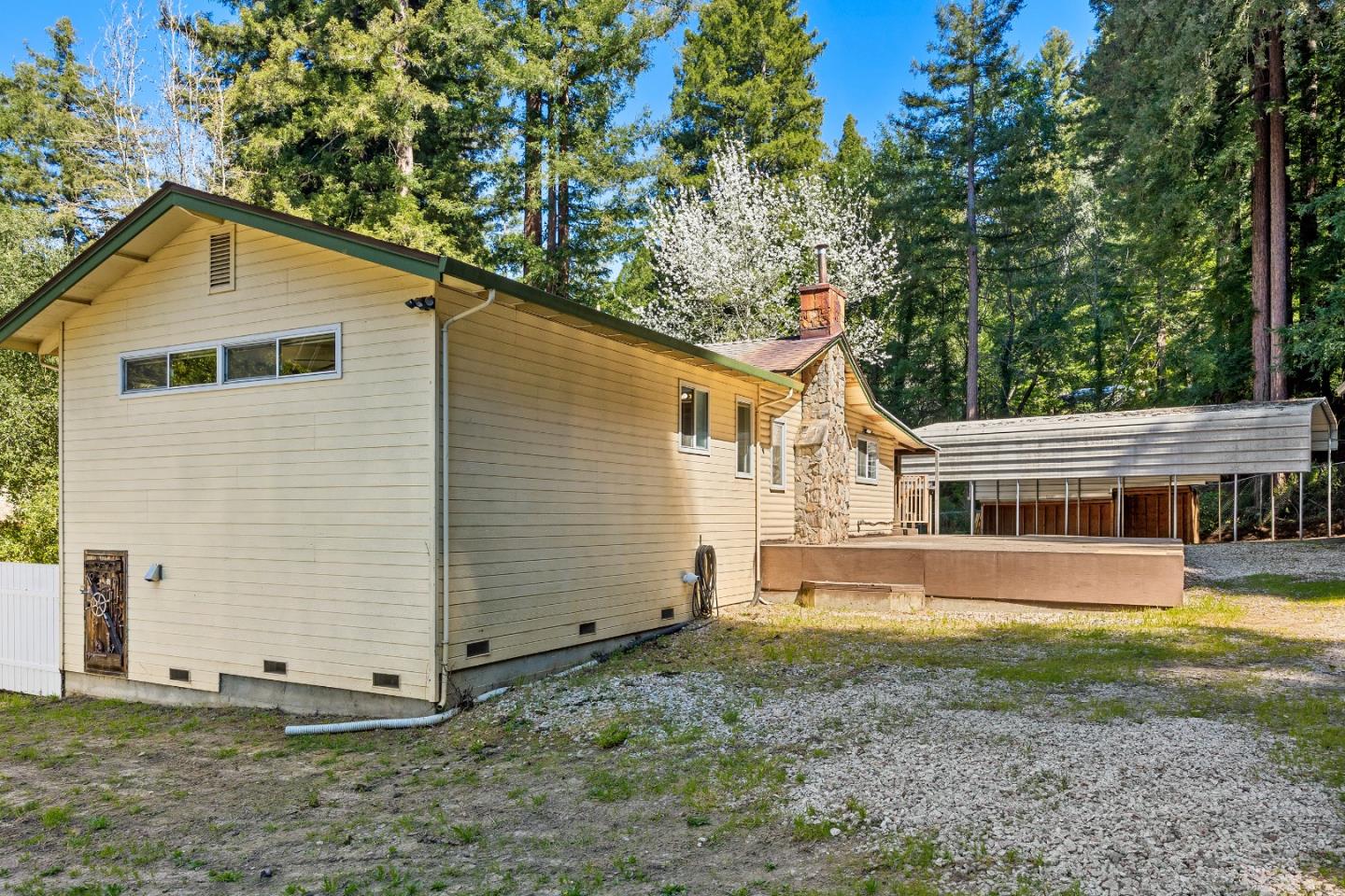 15666 Kings Creek Road Boulder Creek, CA 95006 - Photo 32 of 40 a view of a house with a yard