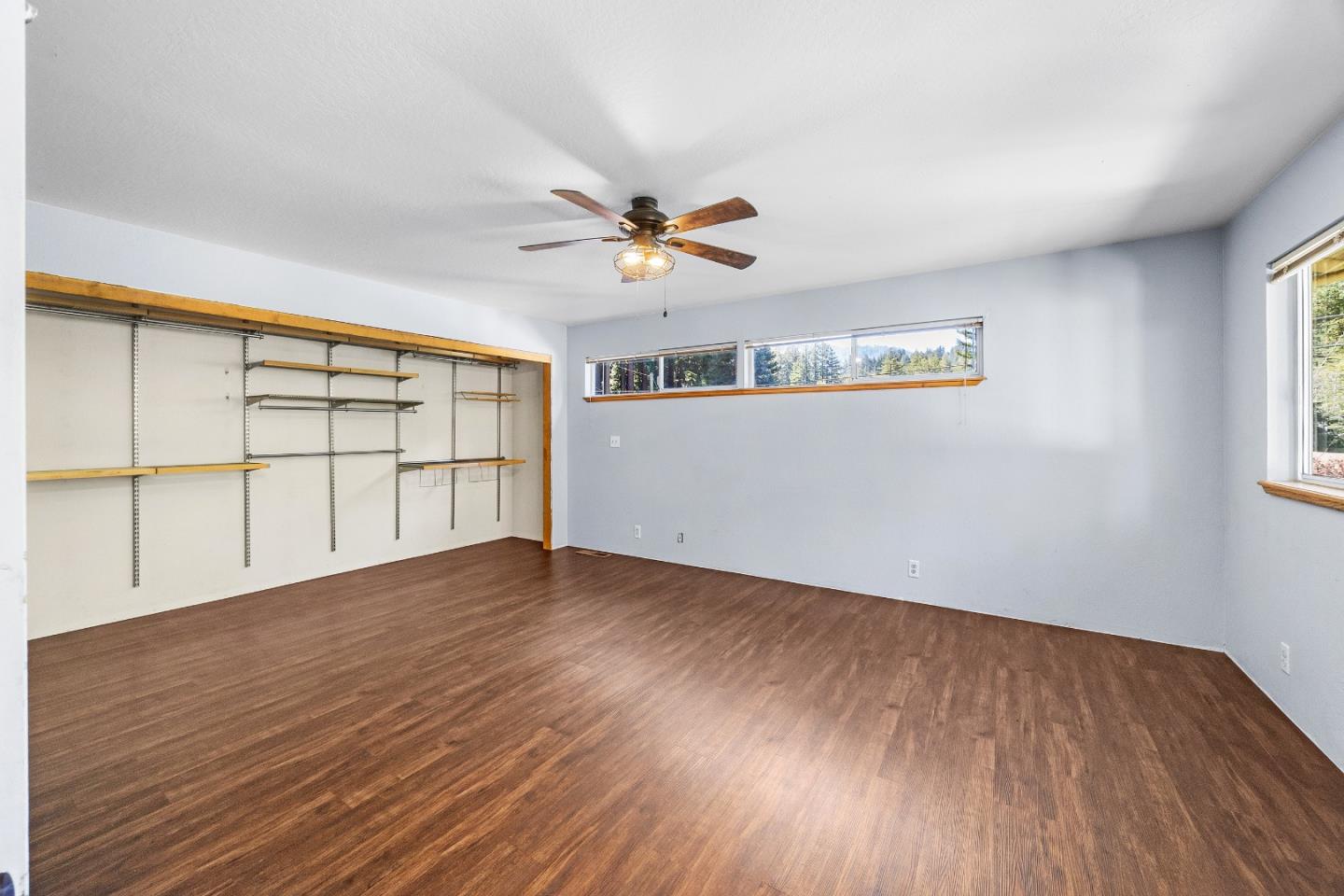 15666 Kings Creek Road Boulder Creek, CA 95006 - Photo 10 of 40 wooden floor in an empty room with a window