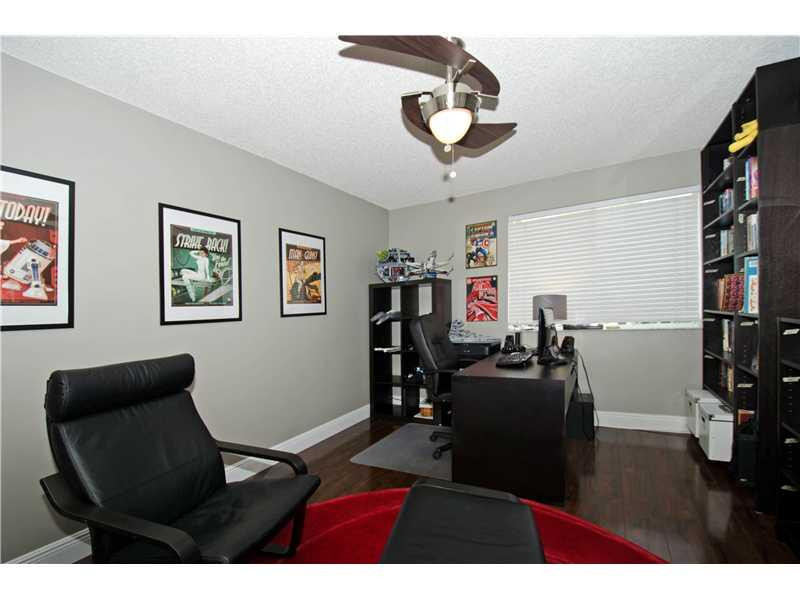 10096 Country Brook Road Boca Raton, FL 33428 - Photo 16 of 29 a living room with furniture and a flat screen tv