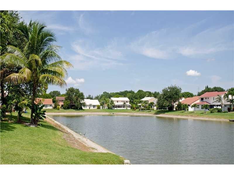 10096 Country Brook Road Boca Raton, FL 33428 - Photo 18 of 29 a view of a lake with a big yard