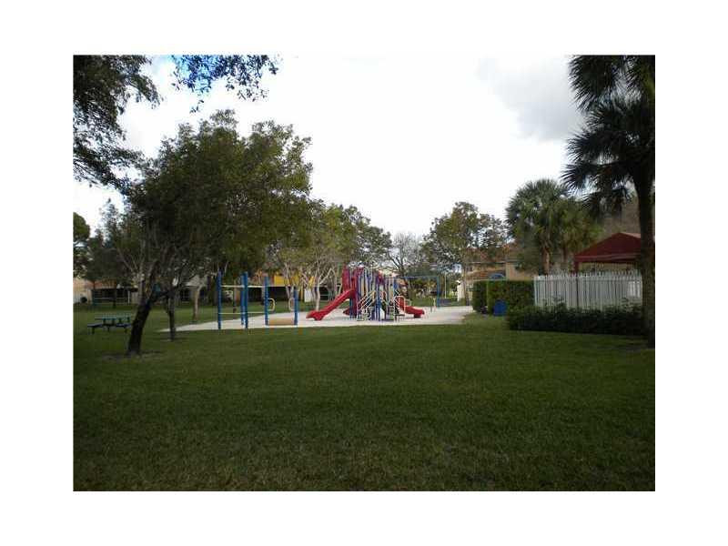 10096 Country Brook Road Boca Raton, FL 33428 - Photo 27 of 29 a picture of a person on a yard
