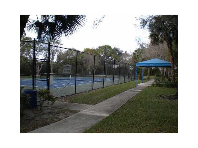 10096 Country Brook Road Boca Raton, FL 33428 - Photo 28 of 29 a view of a backyard with a garden