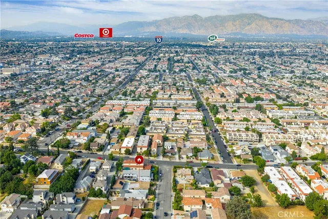 an aerial view of residential building and parking space