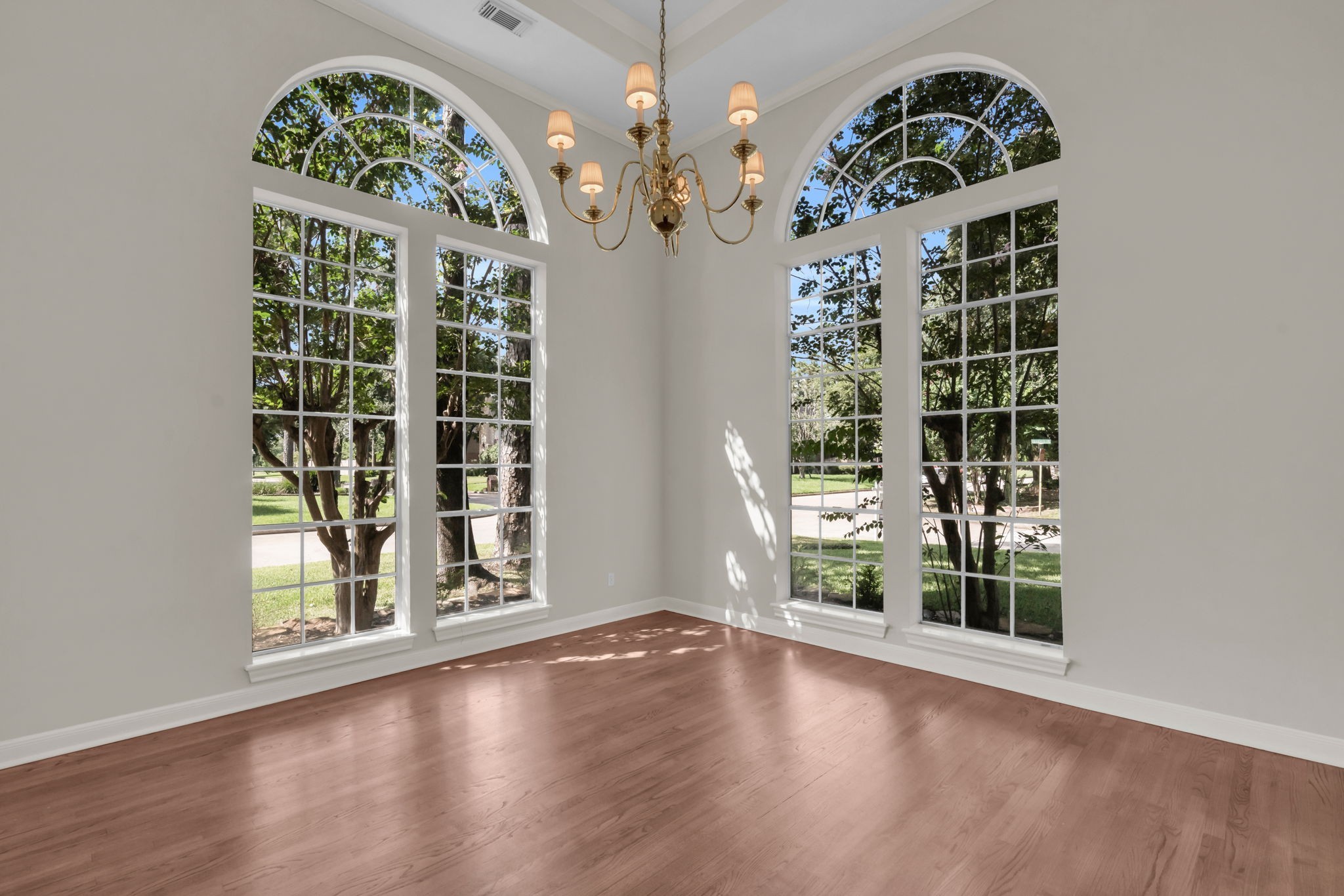 17302 Chagall Lane Spring, TX 77379 - Photo 8 of 44 Formal living room with soaring arched windows and abundant natural light