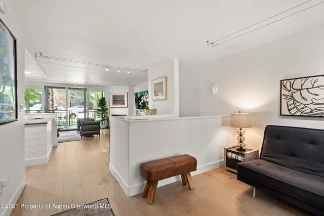 a living room with furniture and a couch