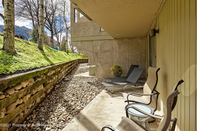 a view of a chairs and table on the wooden floor