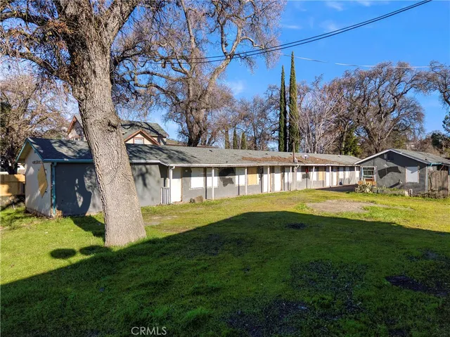 a view of a house with a big yard