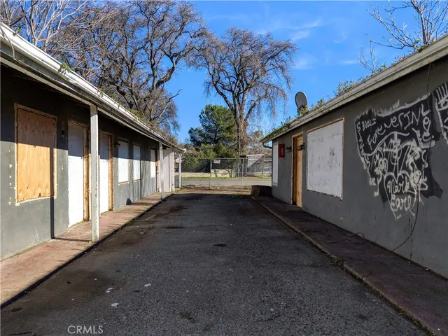 a view of a back yard of the house