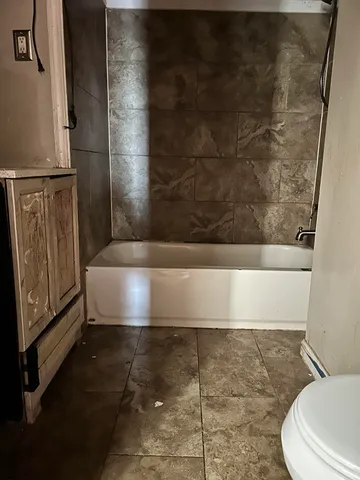 a view of bathroom with bathtub