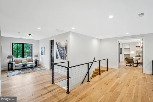 a bathroom with a sink toilet a mirror and shower