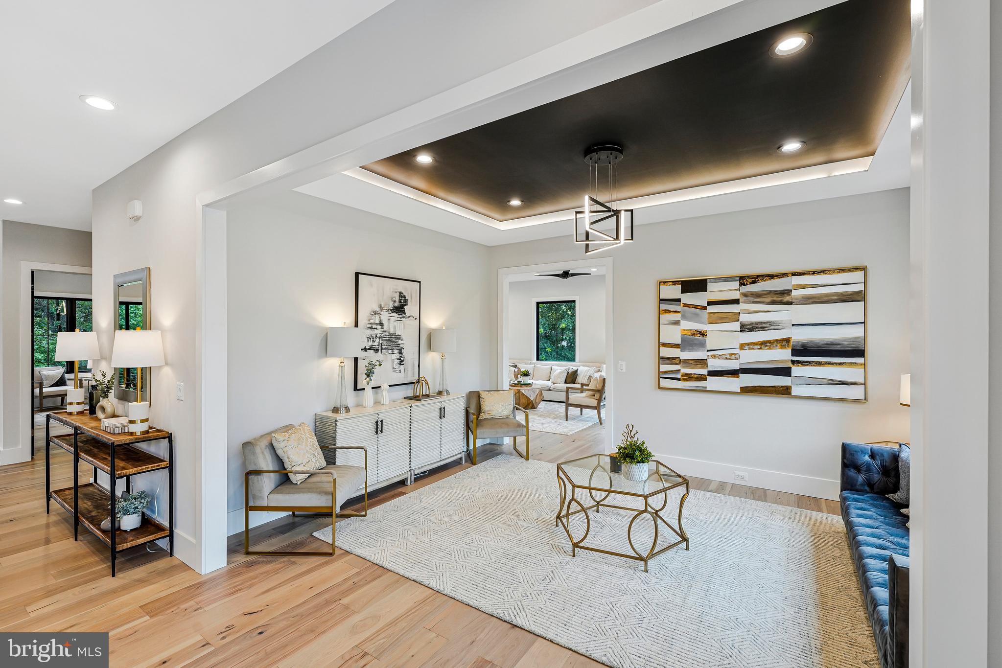 11410 Waples Mill Road Oakton, VA 22124 - Photo 62 of 104 a living room with furniture and wooden floor